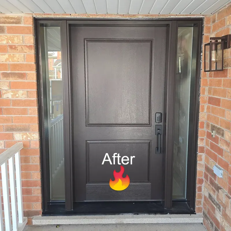 After: dark single entry door with glass sidelites