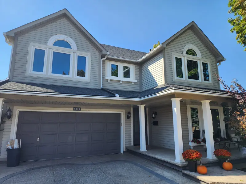 Two-storey home after new windows and front door